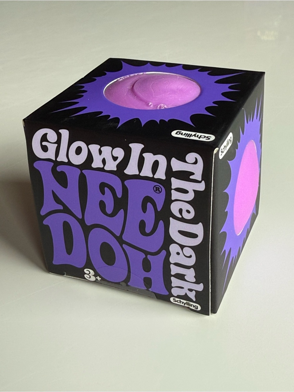 Needoh glow in the dark. Brand new. Purple.